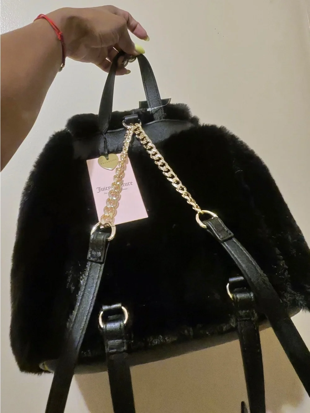 Juicy Couture Dreamy Divas black faux fur backpack with drawstring closure